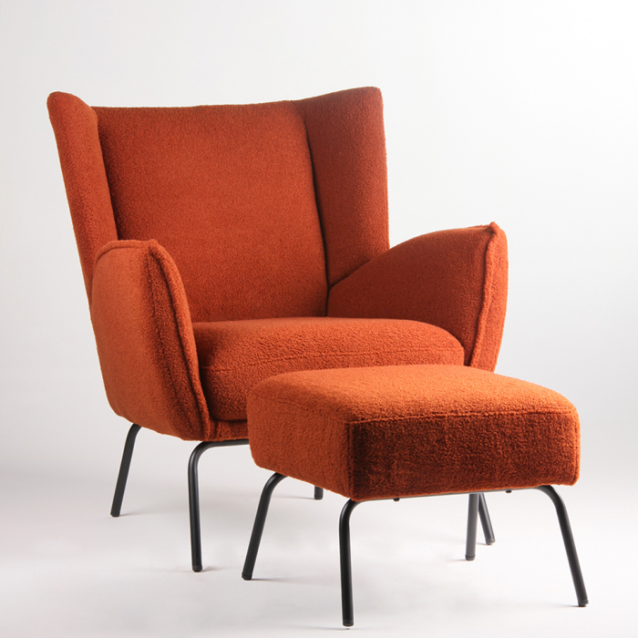 orange chair and footstool