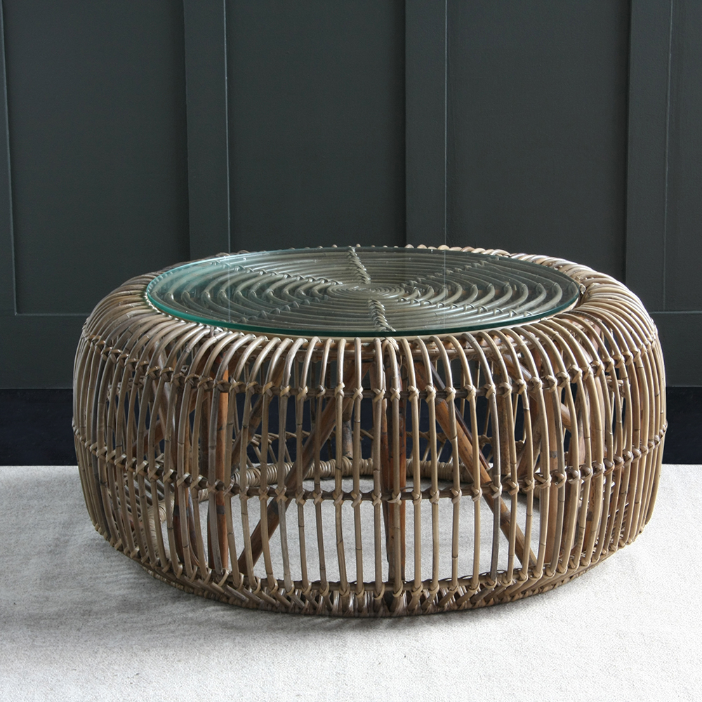 Round Rattan coffee table with glass top by Where Saints Go